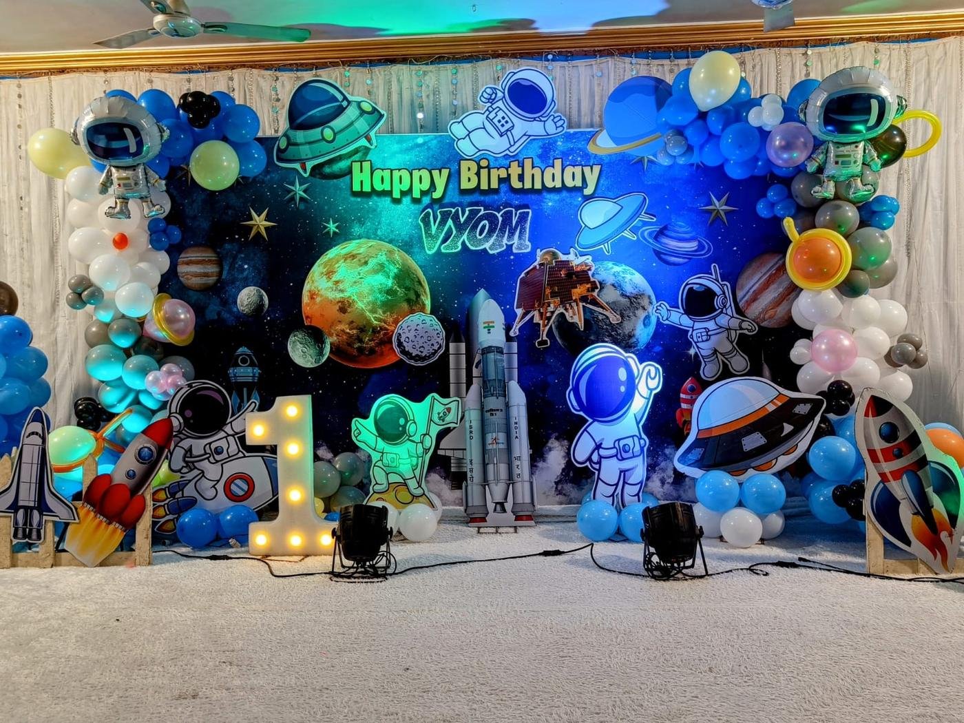 Balloon and floral birthday backdrop by Shivam Tent House in Gurgaon